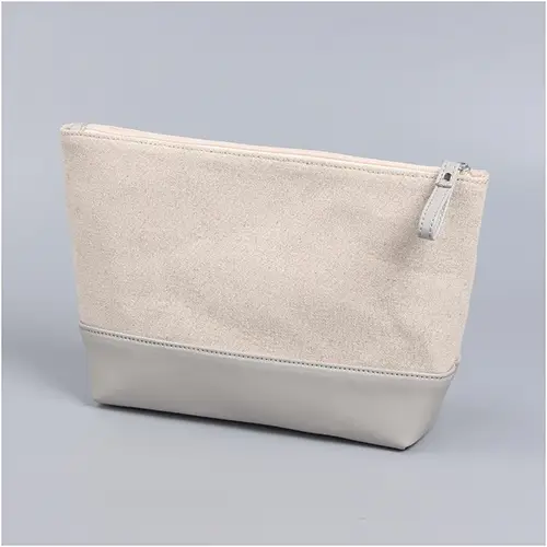 close-up-leather-pull-tab-zipper-on-canvas-bag