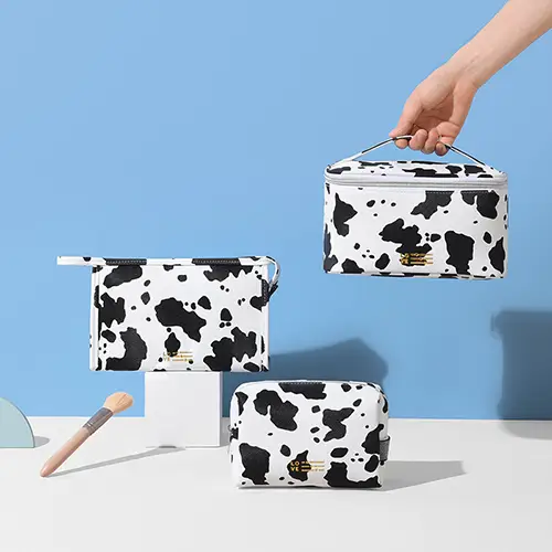 OEM Cow Print PU Leather Makeup Bag Set Manufacturer for Fashion & Beauty Brands