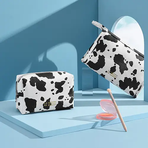 OEM Cow Print PU Leather Makeup Bag Set Manufacturer for Fashion & Beauty Brands